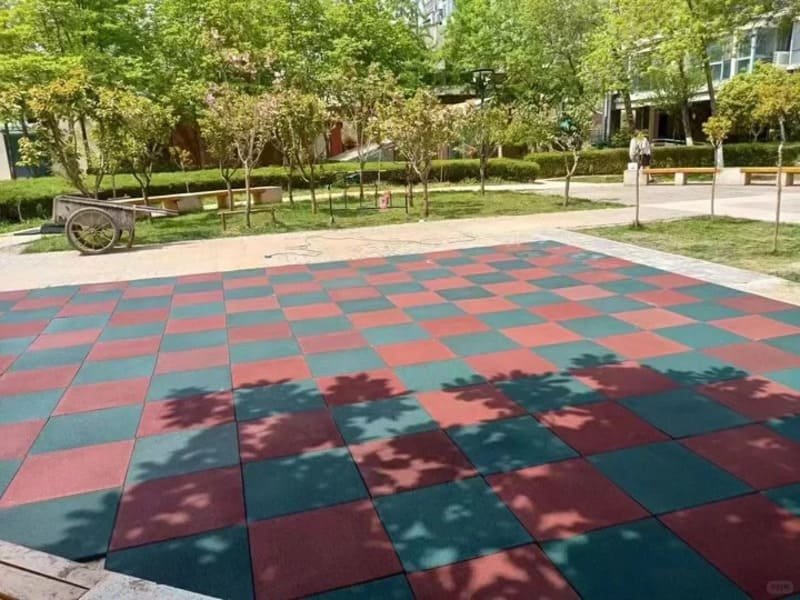 comparison of rubber tiles and turf